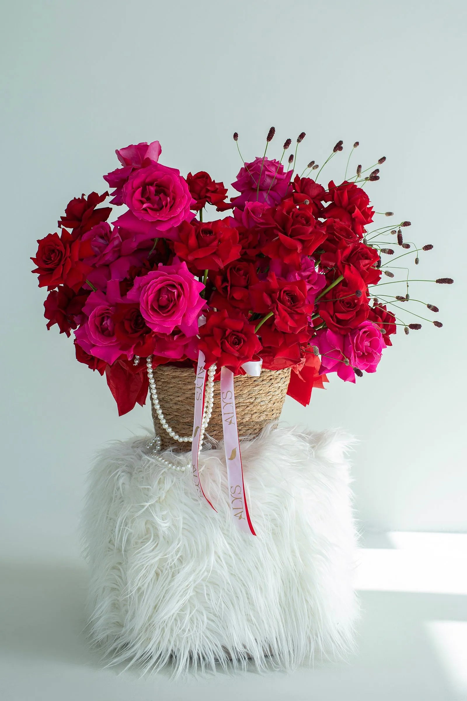 Bouquet of Pink Floyd roses and red roses by ALys Studio Dubai