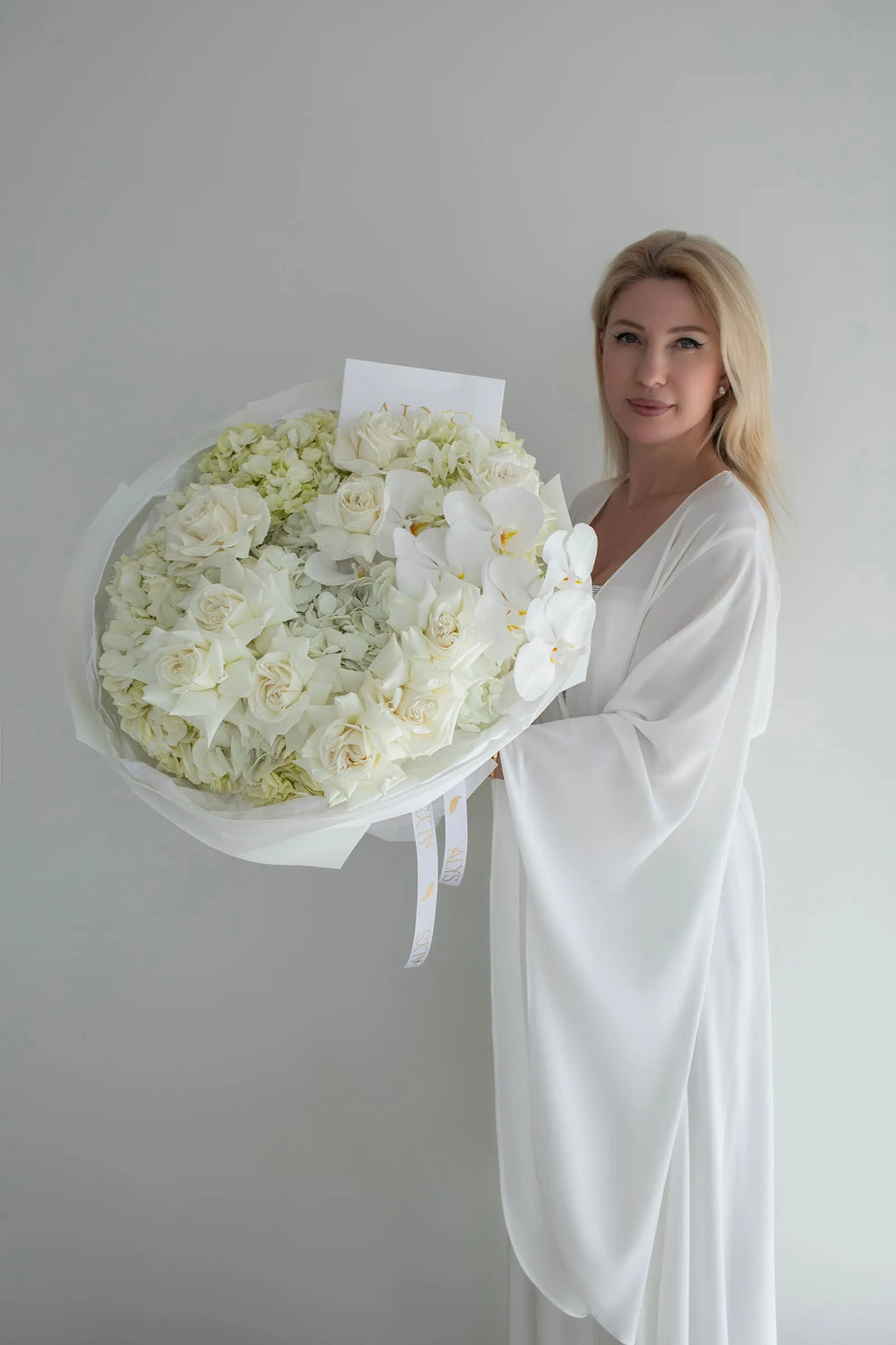 Refined bouquet of roses, hydrangea and orchids by ALys Studio Dubai