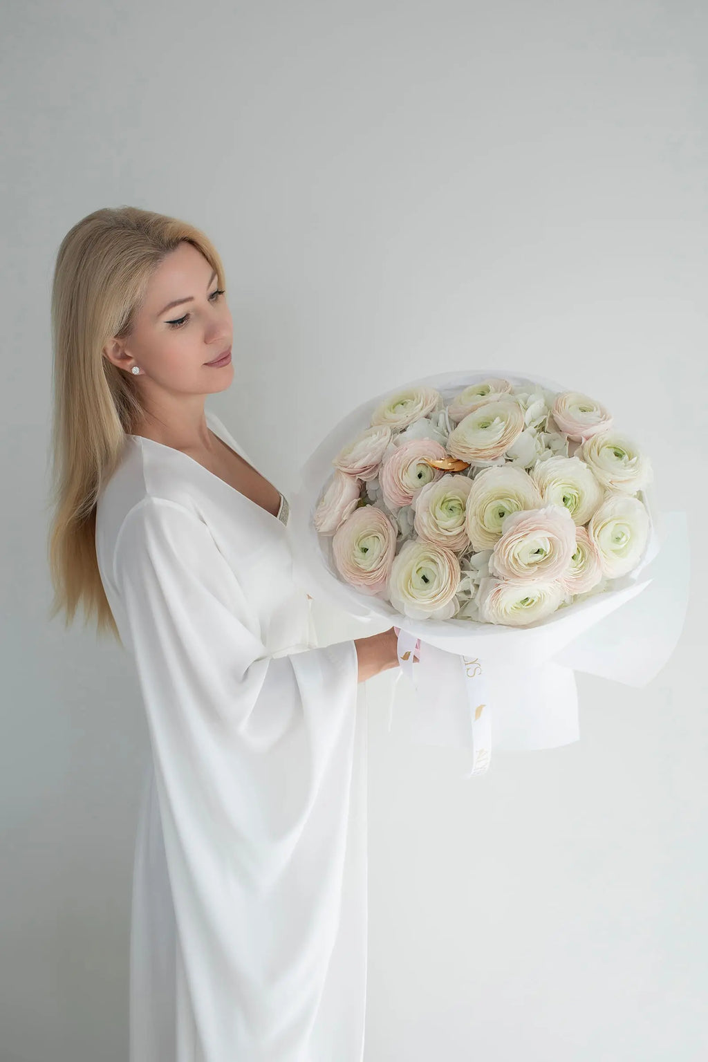 Soft bouquet of hydrangeas and ranunculus in pastels by ALys Studio Dubai