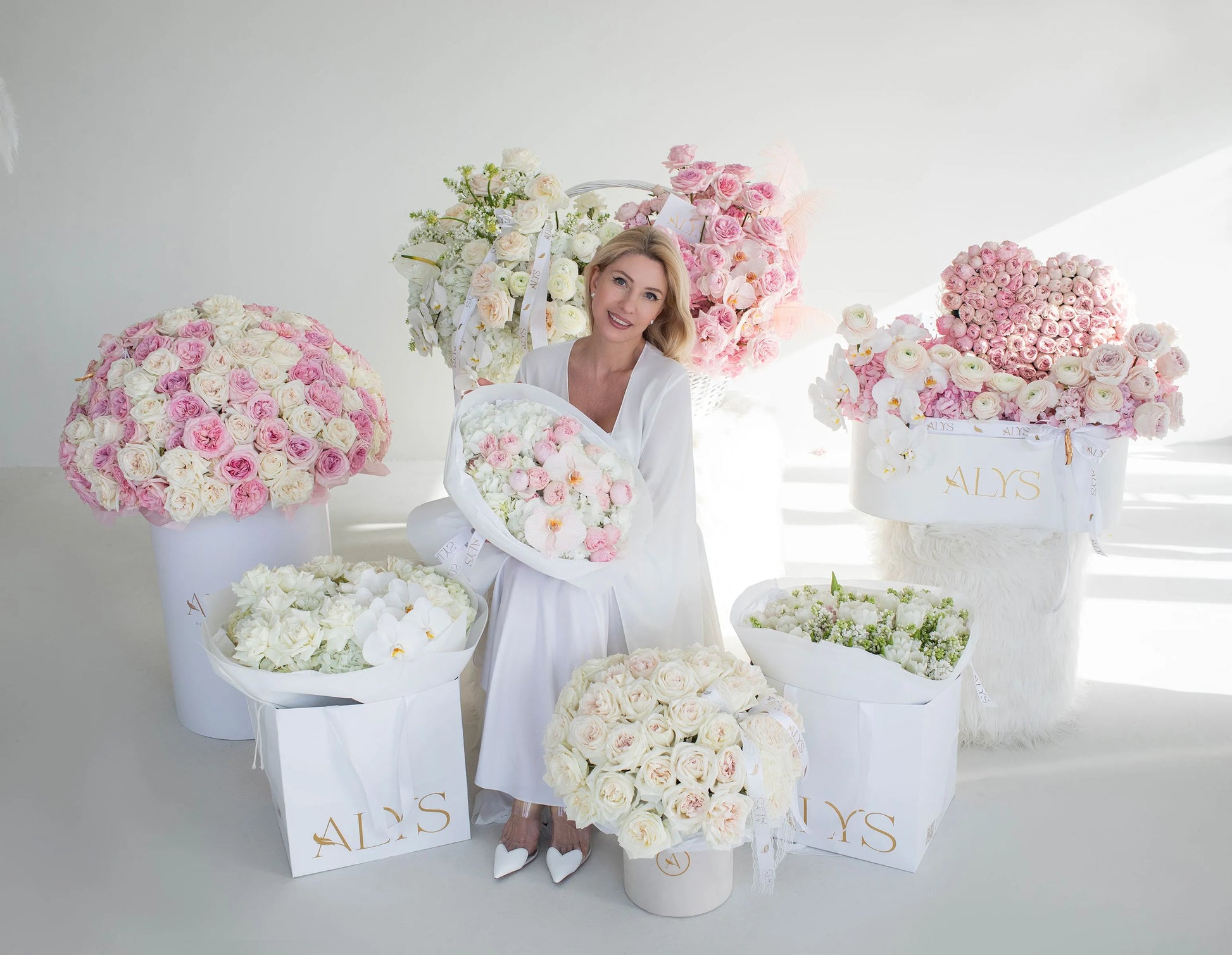 Luxury blooming room filled with peony roses, hydrangeas and orchids by ALys Studio Dubai