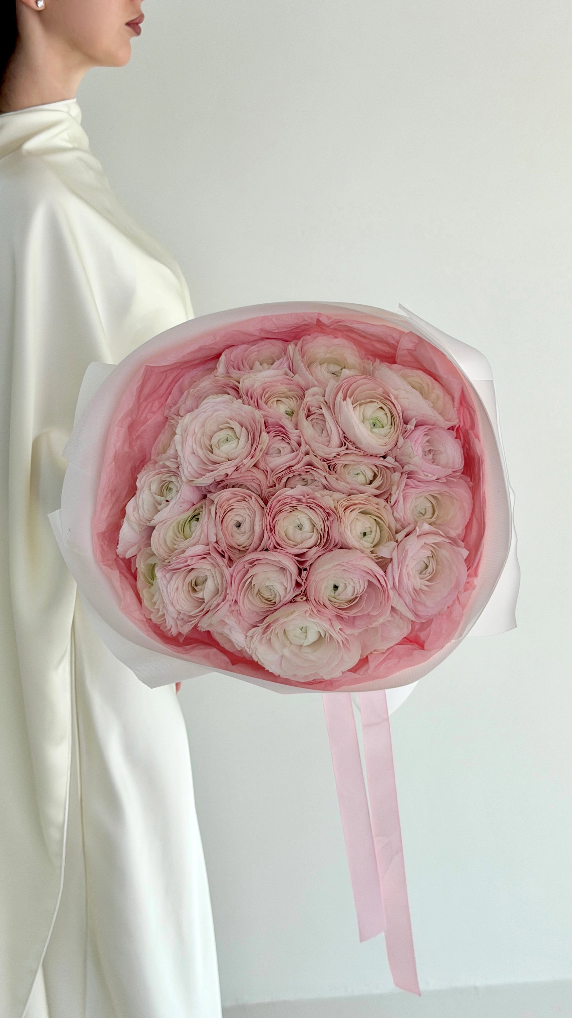 Mono bouquet of pink ranunculus blooms by ALys Studio Dubai