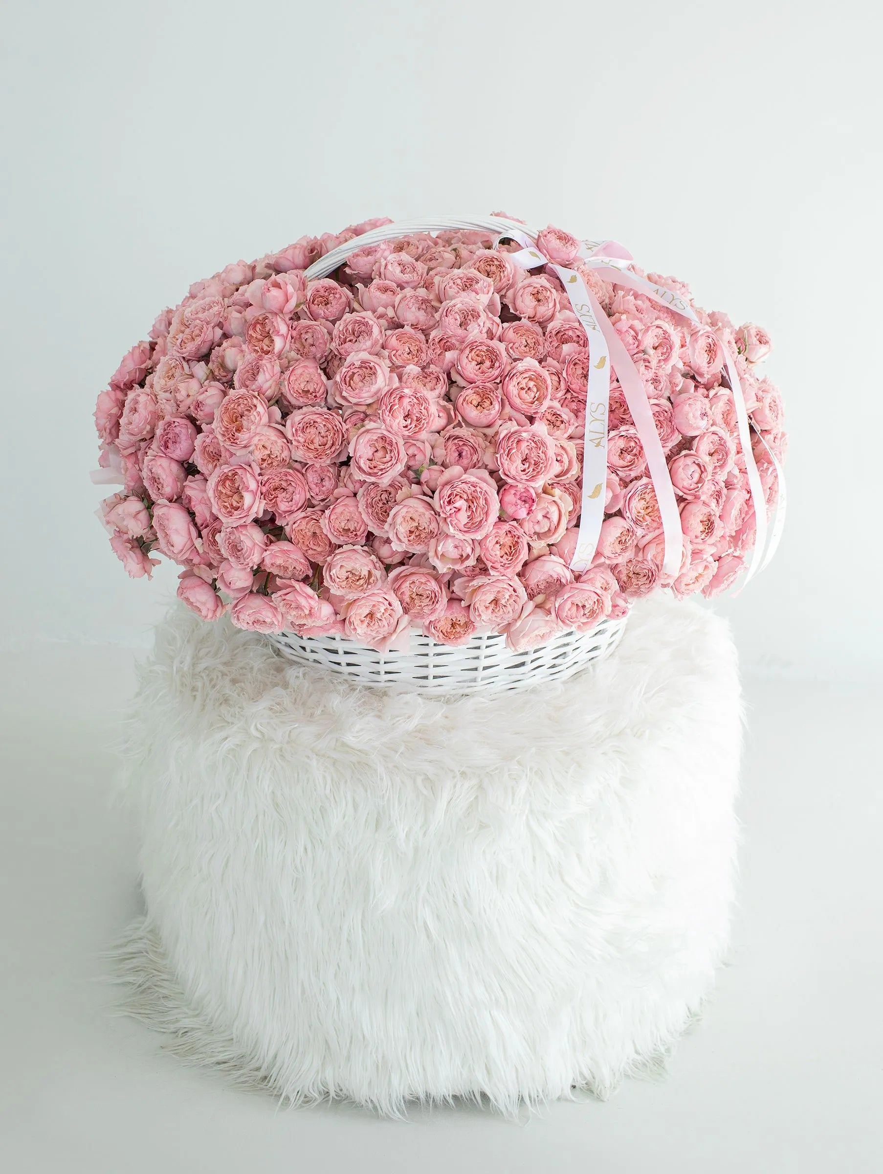 Lavish basket of pink premium peony roses by ALys Studio Dubai