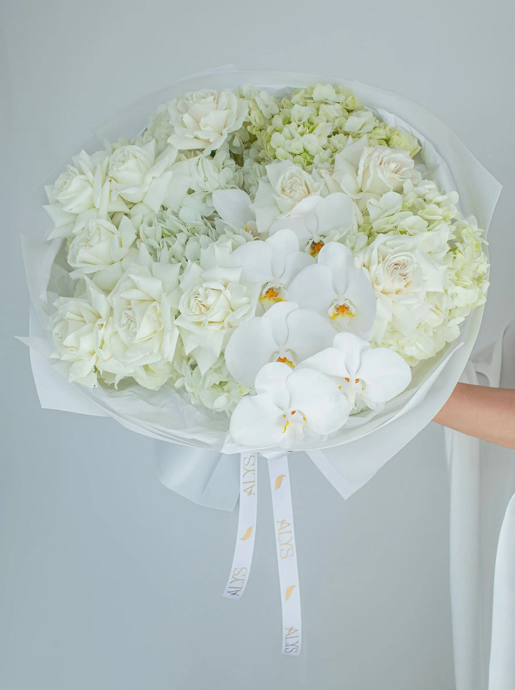 Refined bouquet of roses, hydrangea and orchids by ALys Studio Dubai