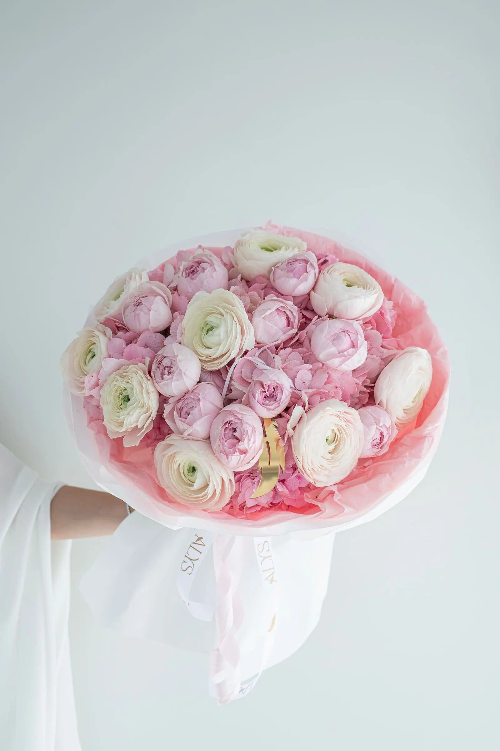Soft bouquet of hydrangea, peony roses and ranunculus by ALys Studio Dubai