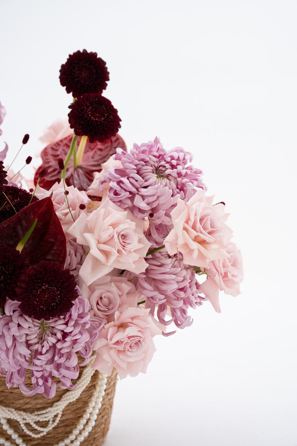 Woven Floral Basket in Pink & Burgundy with Exotic Blooms