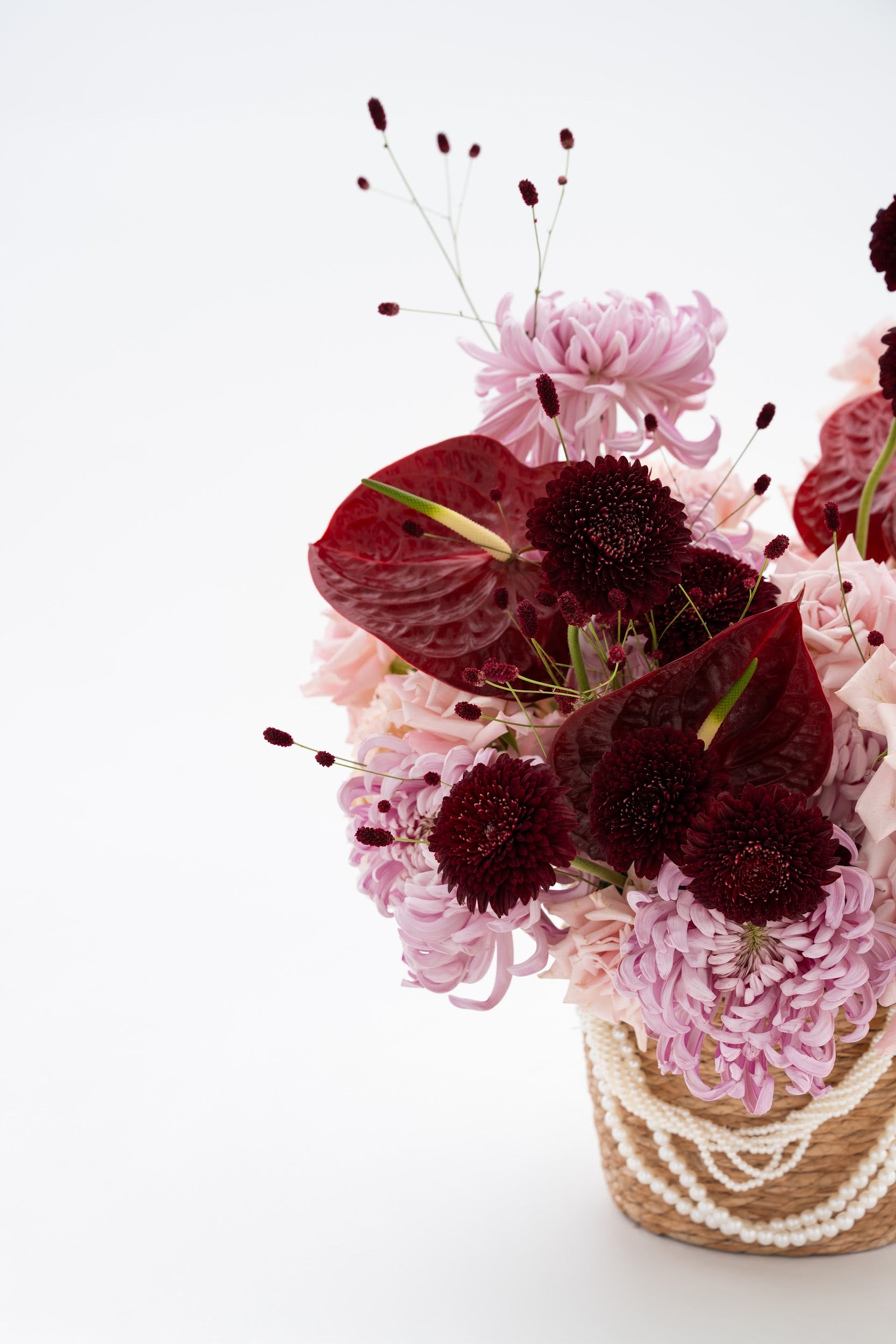 Woven Floral Basket in Pink & Burgundy with Exotic Blooms