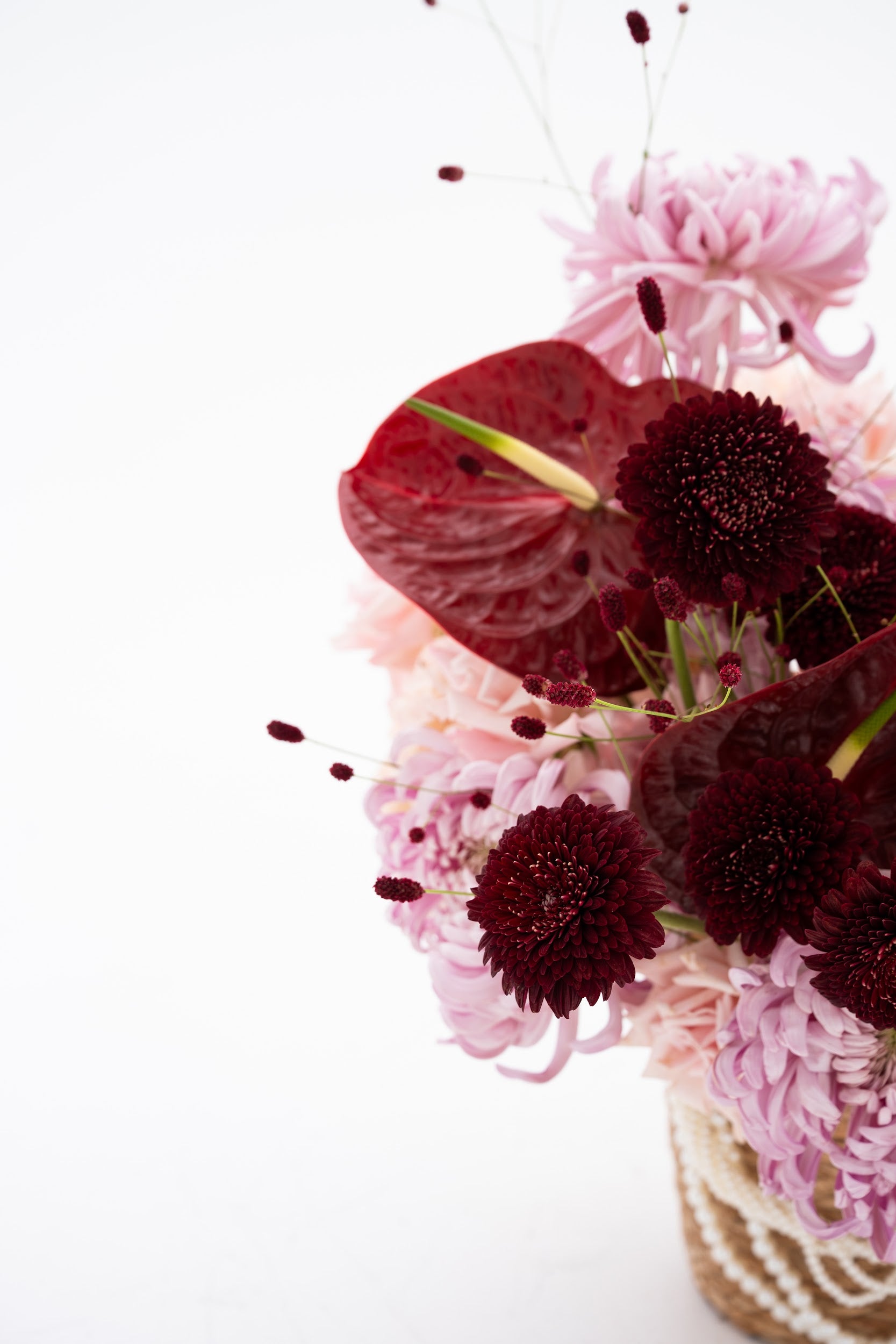 Woven Floral Basket in Pink & Burgundy with Exotic Blooms