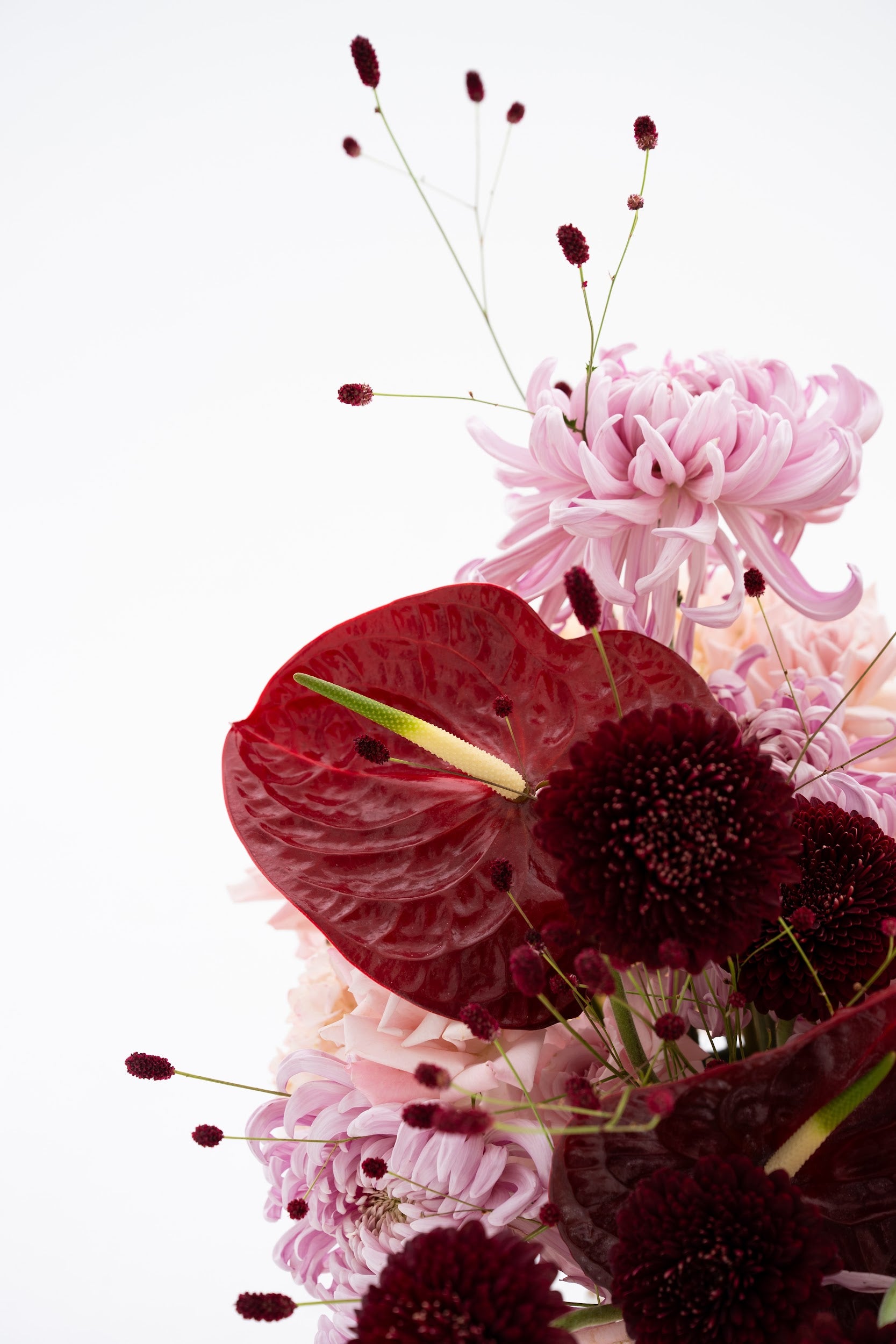 Woven Floral Basket in Pink & Burgundy with Exotic Blooms