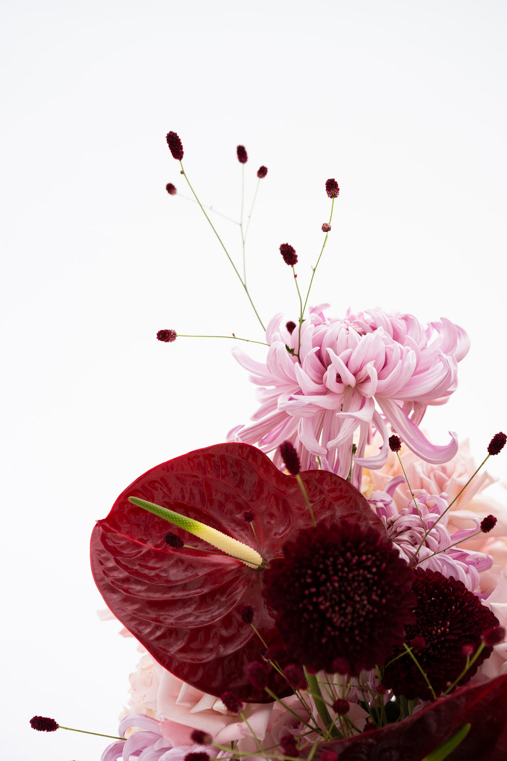 Woven Floral Basket in Pink & Burgundy with Exotic Blooms