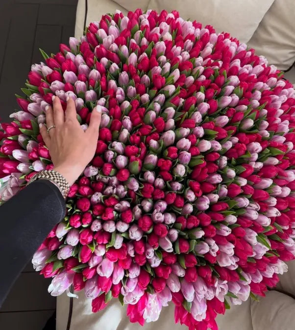 Generous bouquet of raspberry and pink tulips by ALys Studio Dubai